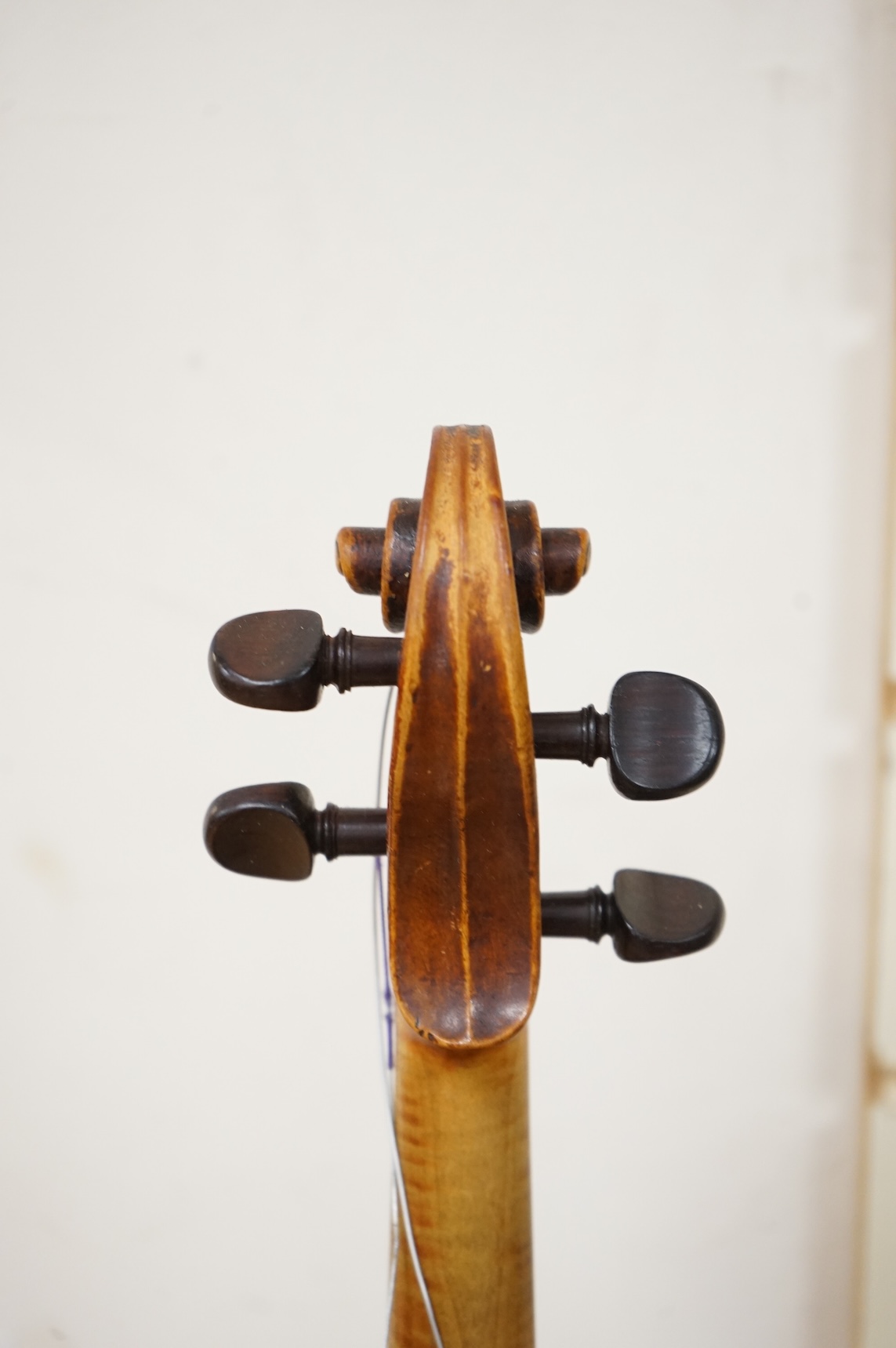 An 18th century violin after Klotz school, 36cm body, with a well cut scroll and an Hill reference number (1191) to the bottom end of the fingerboard, in a Rushworth and Draper case.
